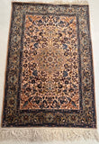 Hand-knotted Persian Isfahan silk and wool rug