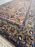 Hand-knotted Persian Isfahan silk and wool rug