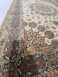A pair of genuine Hand-knotted Persian Tabriz rugs